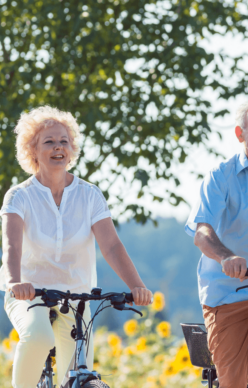 Enhanced-Mobility-Aging-Treatment A happy aging couple enjoying good health.